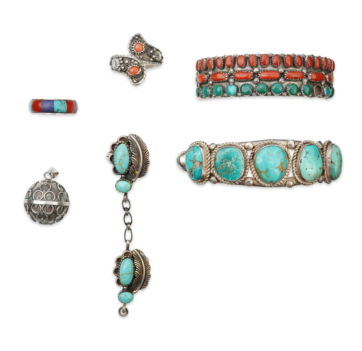A collection of silver jewellery including a Zuni bangle